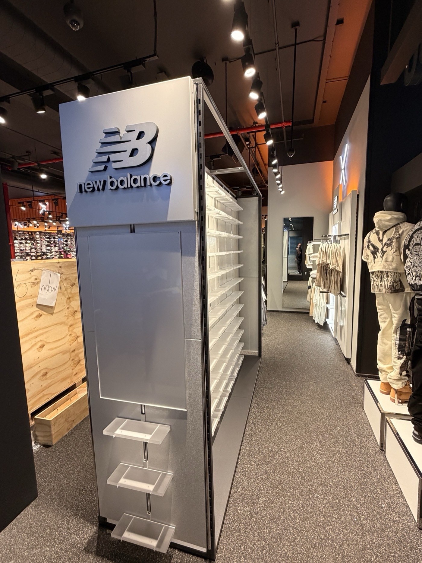 New Balance store fixtures by World of Retail Services