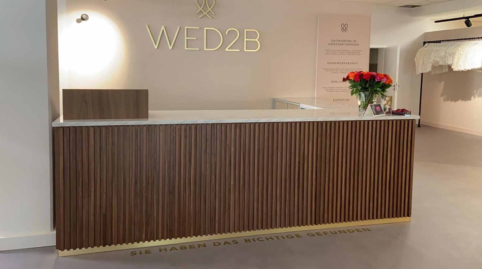WED2B store reception desk, turnkey shop fitting by World of Retail Services